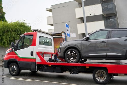 Canvastavla Car towing service driving on an open road