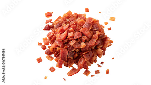 Schilderij op canvas Pile of small crunchy red dried bacon bits toppings isolated on transparent back
