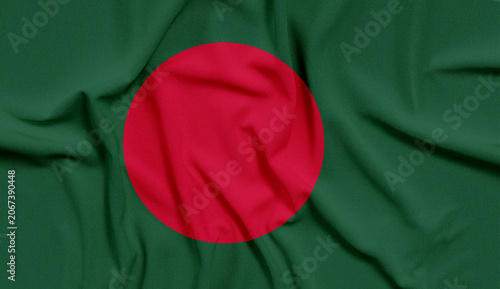 Obraz na plátně Bangladesh flag features a vibrant green field with a centered red disc representing the rising sun