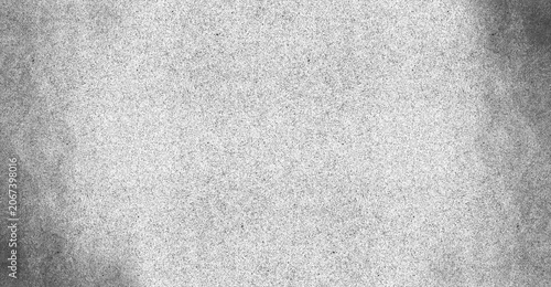 Photos Abstract speckled texture background with grainy effect and vignette