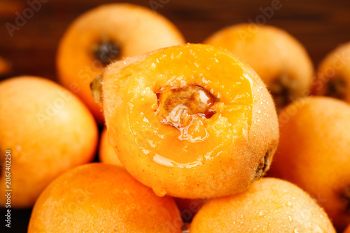 Fresh Loquats from Sichuan Province China Showing Sweet Orange Flesh and Natural Pit Stone Fruit Close-up