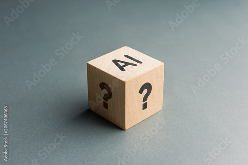 AI Uncertainty and Question Concept with Wooden Block and Question Marks