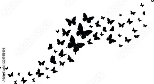 Foto A flock of black butterflies flying in a diagonal line