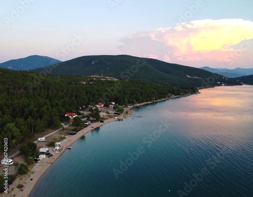 Scenic lake shore at sunset