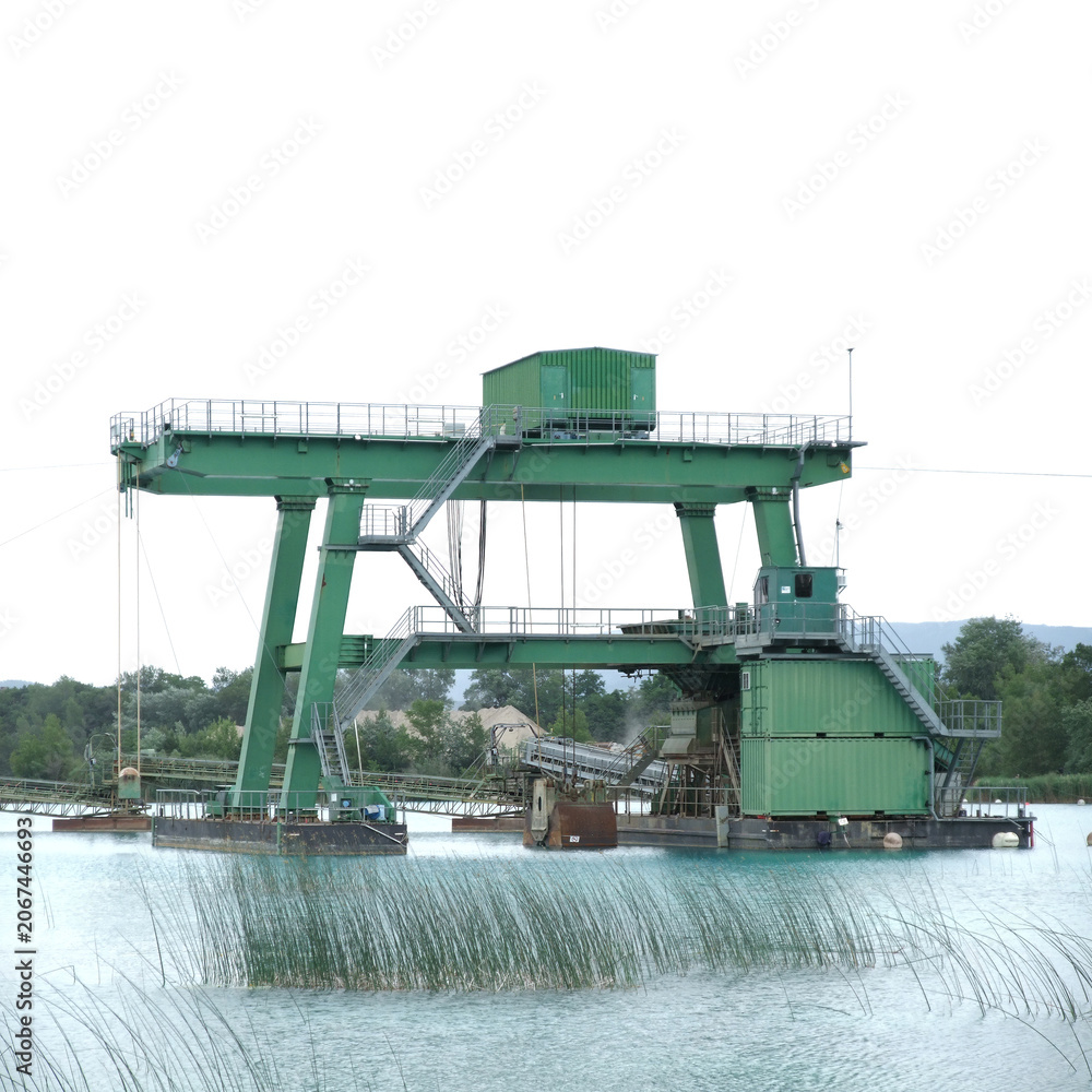 Obraz premium Green Floating Industrial Crane