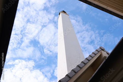 Canvastavla Thai temple crematorium chimney towering up into the bright blue sky