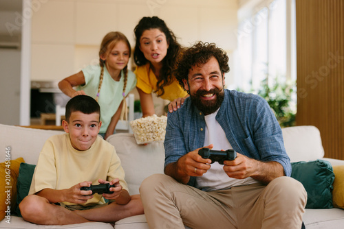 Family enjoying video game fun at home