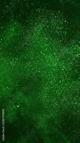 Green glitter background effect, vertical video featuring shimmering sparkling particles, elegant festive motion and luxurious abstract light animation
