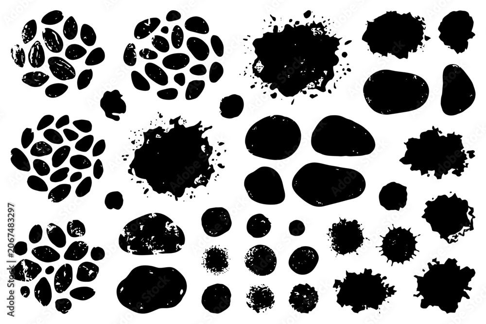 Fototapeta premium Abstract grunge ink splatter and blob textures on white background.