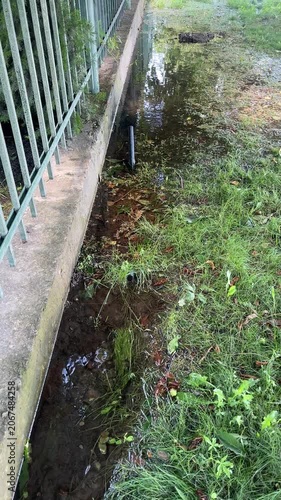 Pump stopped dewatering the flooded area and dispose the water through the rubber hose