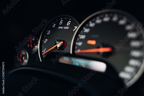 фотографія Sports car tachometer and dashboard with backlight