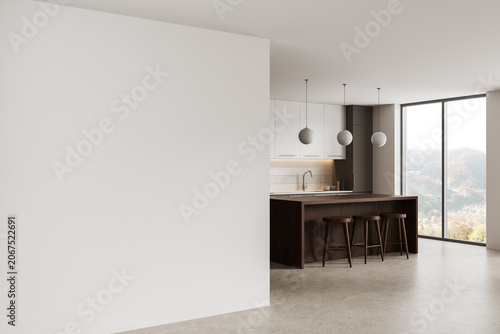 Photos Minimal interior scene with large empty white wall as mockup template beside modern kitchen island with stools and panoramic window in bright spacious room