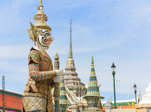 Grand Palace Bangkok Thailand - Golden Demon Guardian and Temple Spires