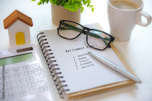 House model  saving for financial wellness and retirement planning of seniors.  Financial Wellness for retirement Concept