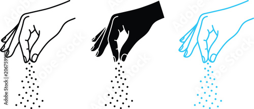 hands sprinkling salt or sand in black and white