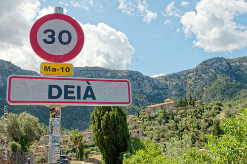 Deia village traffic sign with speed limit on Mallorca route MA-10