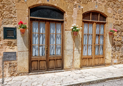 Old street in historic town of Deia in the mountains of Mallorca, Spain