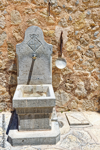 Stone fountain in the Artist village Deià, Mallorca, Balearic Islands, Spain