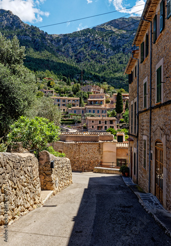Old street in historic town of Deia in the mountains of Mallorca, Spain