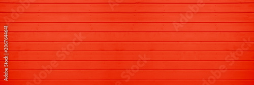 Fotografie red scarlet painted wooden planks background with subtle wood grain texture Wide