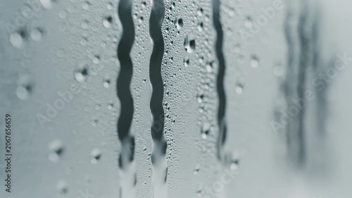 Raindrops on Glass Window During Stormy Weather