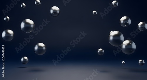 Floating silver spheres on dark background
