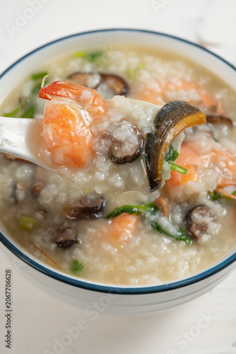 angle view eel and fresh shrimp porridge at vertical composition
