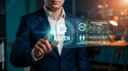 Professional businessman interacting with a digital holographic interface focused on the kaizen lean manufacturing methodology concept