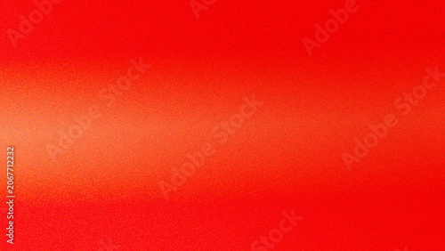 Fotografie Vibrant abstract horizontal grain gradient background with warm orange light streak across fiery red noise texture