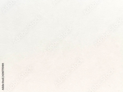 Light beige or cream colored paper texture background