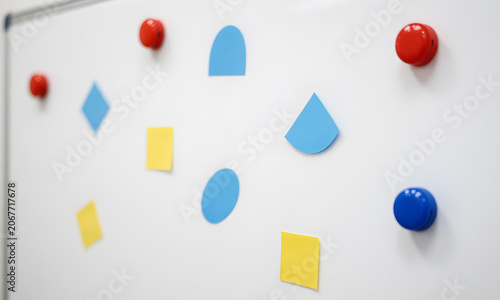Colorful Paper Stickers on Refrigerator