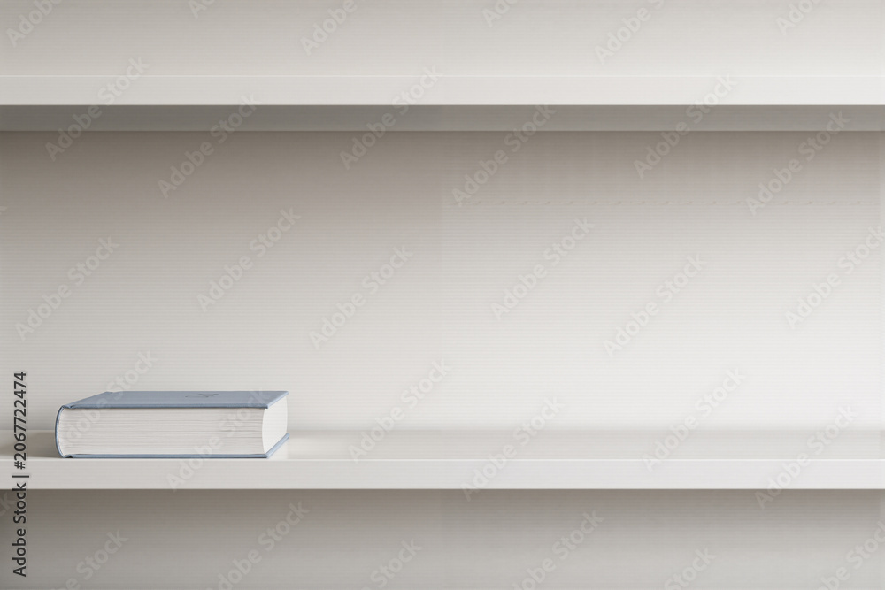 Fototapeta premium Single closed book lying on empty white shelf in minimalist room with minimalist, background