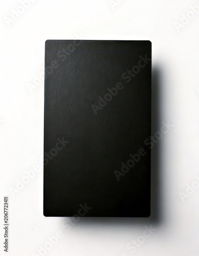 Minimalist Black Rectangular Object on White Background.