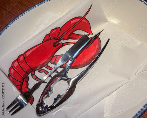 Crab Leg Cracker and Seafood Fork on Lobster Bib