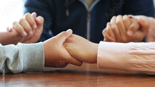 Group of people praying. Christian worship and pray. Christian group of people holding hands praying worships together to believe
