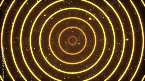 Golden light trails in space with sparkling particles