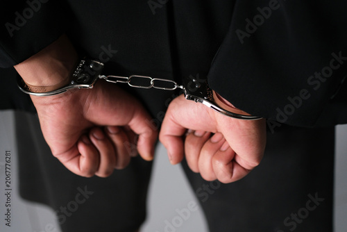 Fotografi Handcuffed behind his back