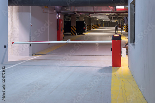 Bild auf Leinwand Automatic boom barrier inside underground garage