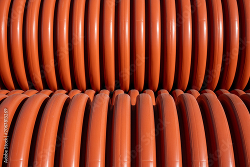 Orange Corrugated Plastic Pipes Background
