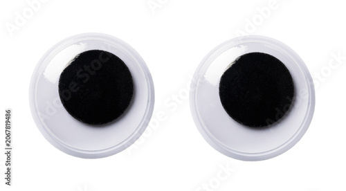 Googly eyes staring, creating fun craft projects