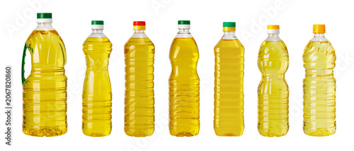 Cooking oil varieties in plastic bottles presenting essential food ingredient