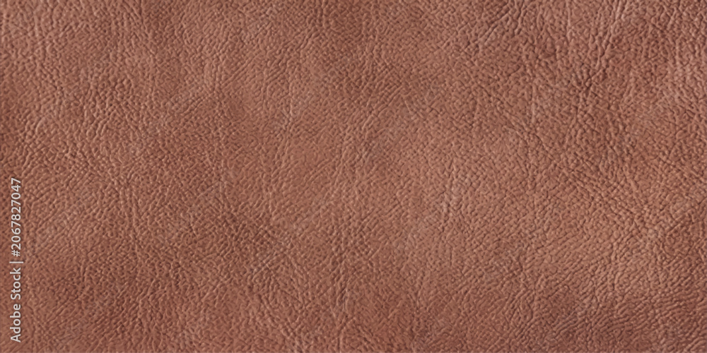Fototapeta premium Close-up of a textured brown leather surface, showcasing the natural grain and rich color of the material.