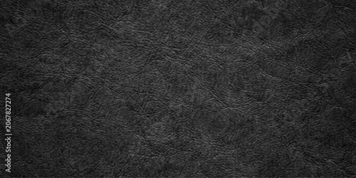 Photos Dark textured background, abstract charcoal surface with subtle striations and depth, conveying a sense of mystery and sophistication