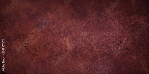 Obraz na plátně A rich, textured close-up of distressed brown leather reveals its rugged beauty, showcasing subtle variations in color and a weathered patina that speaks of enduring quality