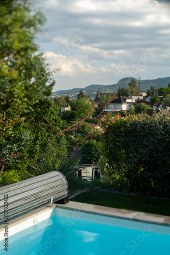 Scenic View of Residential Area with Swimming Pool and Garden