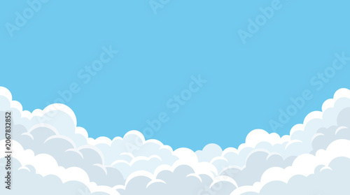 Obraz na płótnie Fluffy white cartoon clouds in clear blue sky.
