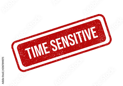 Red rubber stamp with the text time sensitive in a grunge style