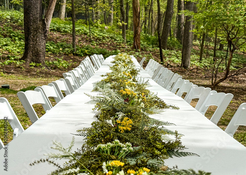 Long Reception Table Decorated for Woodland Wedding Celebration