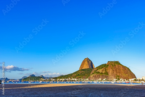 Botafogo Bay in the city of Rio de Janeiro with Sugarloaf Mountain and anchored boats.