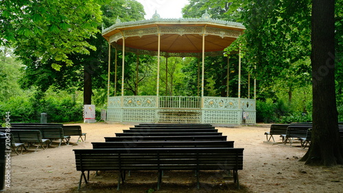 Vászonkép Ornate bandstand pavilion in verdant park setting